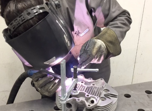 TIG welding repair of broken cooling fin on classic motorcycle cylinder head